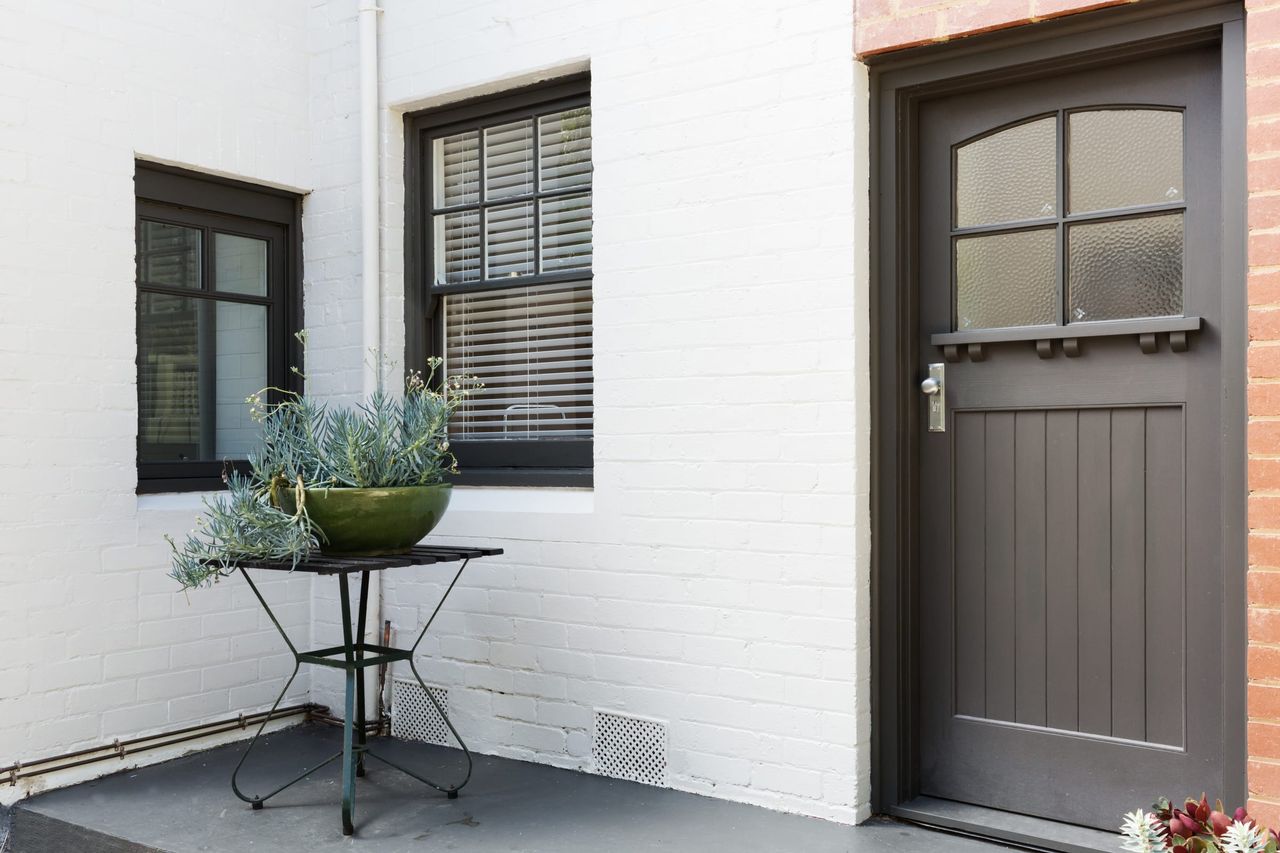 Window and door detail of a rendered house