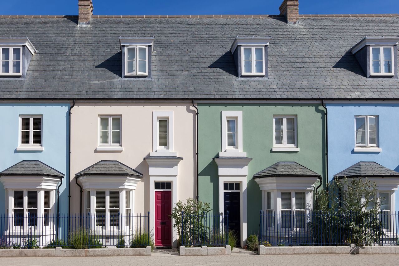 A terrace of adjoining houses, each sharing a party wall with its neighbour